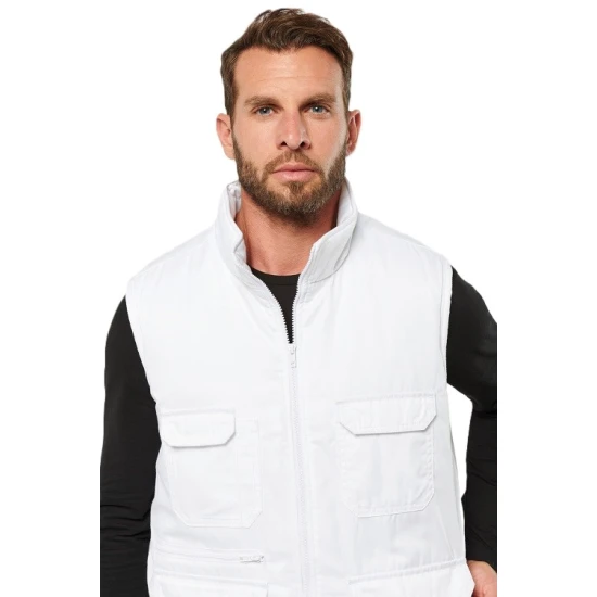 Vesta de lucru vatuita albastra din tercot, cu buzunare multiple Vesta de lucru vatuita albastra din tercot, cu buzunare multiple