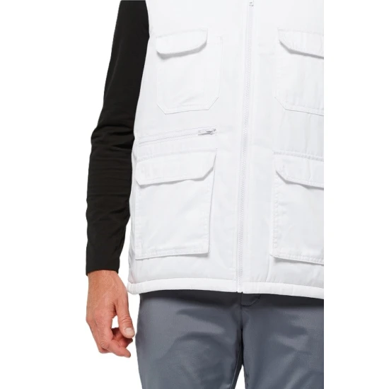 Vesta de lucru vatuita albastra din tercot, cu buzunare multiple Vesta de lucru vatuita albastra din tercot, cu buzunare multiple